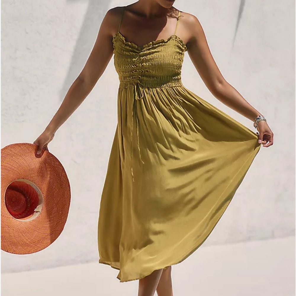Anthropologie Blue Tassel smocked midi length dress